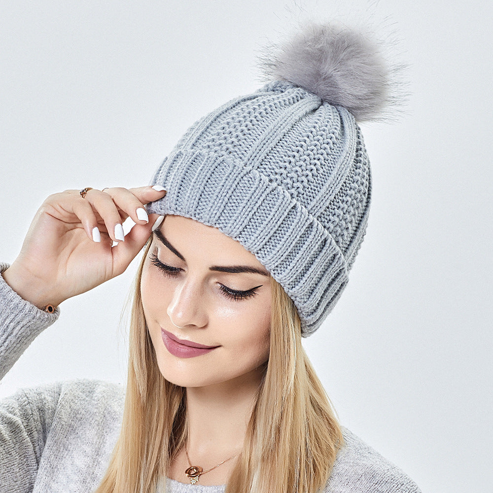 Women's Knitted Beanie with Faux Fur Pom Pom